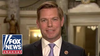 Tucker takes on Swalwell over Trump treason claims [upl. by Sweatt]