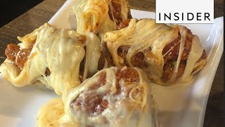 Korean Restaurant Wraps Spicy Chicken In Melted Cheese [upl. by Kurys]