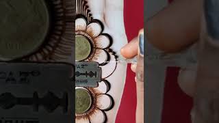 Beautiful mehndi design using blade and coins  video newkavyamehndishorts [upl. by Alcock]