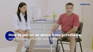 How to put on an above knee prosthesis with Pin Liner Shuttle Lock System  Ottobock [upl. by Neveda]