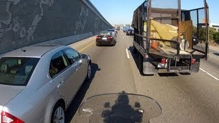 Motorcycle vs Truck Door while Lane Splitting [upl. by Ailecec954]