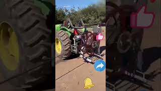 Retrieving irrigation pipes from farmland using a tractor [upl. by Lissak]