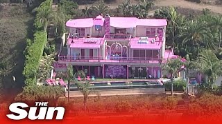 Barbies Malibu Dreamhouse comes to life complete with dance floor pink slide and massive pool [upl. by Haraz298]