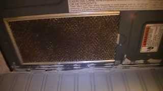 How To Remove Change Exhaust Filters on a Whirlpool Microwave [upl. by Clarke]