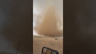 Landspout Spins Powerfully Under a Thunderstorm [upl. by Cho]