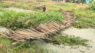 Remove Plants Clogged On Dam And Water Gateunclog canal drainagechannel drainage flashflood [upl. by Buttaro740]