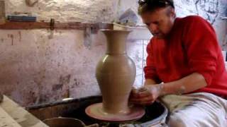 Throwing a big clay pottery vase on the wheel [upl. by Ahsael]