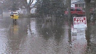 Flooding In Alpena Michigan Thawing Snow And Rain Floods Roads [upl. by Aniraz]