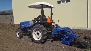 WORKMASTER 40 NEW HOLLAND BARBECHANDO ARADO 2 DISCOS [upl. by Moneta723]