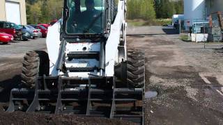 Bradco Land Plane Demonstration  Skid Steer Solutions [upl. by Aleakim534]