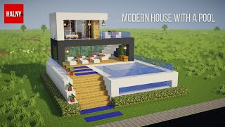 How to build a modern house with a pool in minecraft [upl. by Nomahs]