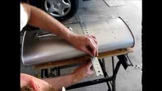 How to Replace the Muffler on a 2000 Dodge Grand Caravan Part 2 Fabricating a Hanger [upl. by Ellehcsar828]