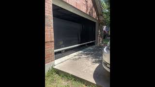 A garage workshop outfitted with our motorized shade in Austin TX garagemakeover austin [upl. by Amitak]