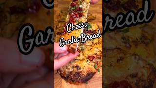 Tasty Cheesy Garlic Bread Recipe food yummy cheese bread garlic garlicbread trending tasty [upl. by Aikenat]