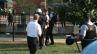 Police arrest proPalestinian protester near DNC Chicago venue as marchers break down fences  AFP [upl. by Doehne]