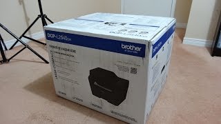 Brother DCPL2540DW Laser Printer Unboxing [upl. by Elahcim]