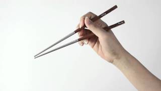 How To Hold Chopsticks Correctly [upl. by Ornstead]