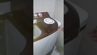 How to remove cloth stuck below washing machine spinner drum [upl. by Drhacir]