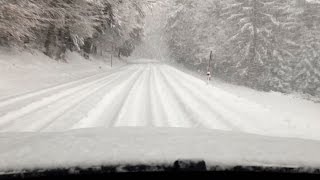 BMW X6 xDrive40d Driving up a Mountain Road in Deep Snow [upl. by Hpesojnhoj]