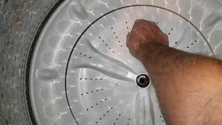 Removing a washing machine wash plate the easy way DIY that anyone can do Maytag Bravos Agitator [upl. by Aenad]