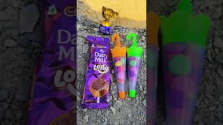 Swiss trupello chocolate amp dairy milk lolipop amp gems shorts dairymilk lollipop [upl. by Timmy]