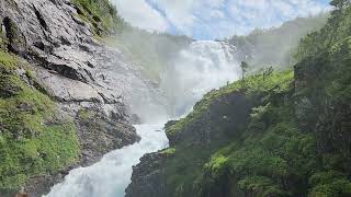 Kjosfossen waterfall from the Flamsbana train in Norway [upl. by Ruscher]