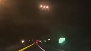 Huge UFO Flies Straight At Car On Highway Passing Overhead Within Meters [upl. by Hardunn]