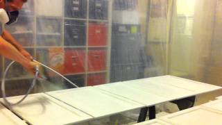 Spraying kitchen cabinets white with airless sprayer in garage [upl. by Jakie358]