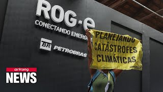 Climate activists strike OPEC global oil outlook event in Brazil [upl. by Erdnua]