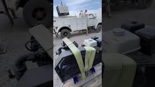 Loading the weldergenerator and the air compressor on the service truck [upl. by Etnahsal]