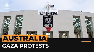 Protestors unfurl ‘war crimes’ banner on Australian parliament  Al Jazeera Newsfeed [upl. by Brothers]