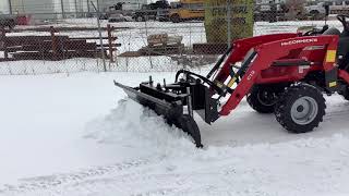 McCormick X125 HP Compact Tractor Pushing Snow [upl. by Charleton]