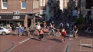 Unbelievably busy bicycle crossing in Amsterdam [upl. by Aizirtap]