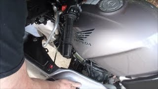 Honda st1300 rear wheel removal and installing 90 degree valve stem [upl. by Efram514]