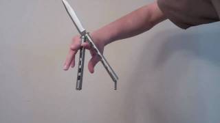 Balisong Tutorial Backhand Twirl Beginner [upl. by Aonian]