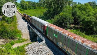 PART I BNSF autorack crossing Dry Creek on NS KC District distant views of the Kansas City Skyline [upl. by Vachel513]