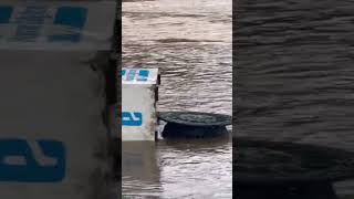 Ice machine floating along flood water at Sedgefield Country Club [upl. by Aikrehs]