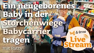 Wie trage ich ein neugeborenes Baby in der Trage Storchenwiege Babycarrier [upl. by Ichabod858]