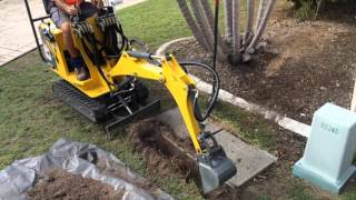 Ozziquip Mini Excavator Digging Out Telstra Pit NOTE THIS MODEL NOW SUPERSEDED [upl. by Meean]