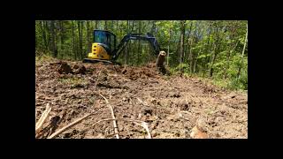 Deere 35G Mini Excavator Removing Stumps amp Grading [upl. by Annavahs]