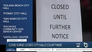 COVID surge closes city halls [upl. by Llehcear943]