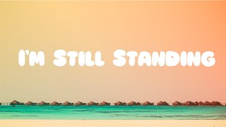 Elton John  Im Still Standing Lyrics [upl. by Anival]