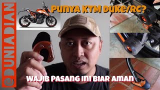 Aksesoris quotWajibquot KTM New Duke 250  390 l Fork Slider Spool Paddock Side Stand Enlarger [upl. by Airoled]