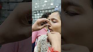 Nose piercing process with needlesilver jewellery trending youtubeshorts shorts [upl. by Adnuhsor]