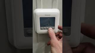 Honeywell t4 pro thermostat temp change [upl. by Dnomayd554]