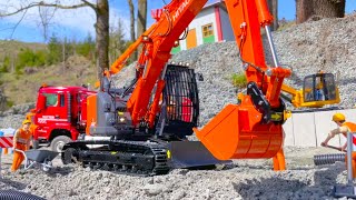 RC TRUCK MAN AND HITACHI 135 DIGGER WORKING HARD IN THE QUARRY  FUMOTEC KOMATSU PC 290 TILTROTATOR [upl. by Naesal739]