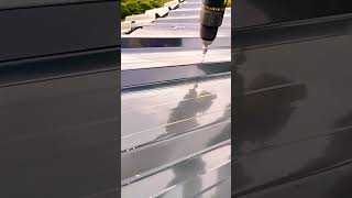 Self drilling screw on grey colour sheet  screwing on sheet [upl. by Haiacim733]