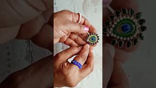 ring😱diyshortsyoutubepartneruniqueampeasyअंगुठीhow to make unique and easy peacockfeather ring [upl. by Selby]