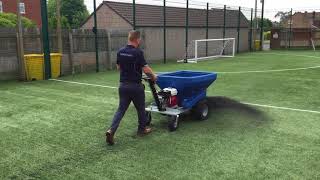 ECO 250 spreading rubber crumb on artificial soccer pitch [upl. by Lalla78]