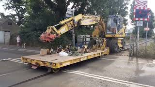 komatsu rail rider mk2 passing over Hamworthy park level crossing [upl. by Novart]